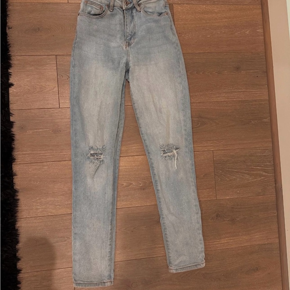 Women's Light Blue Distressed Jeans